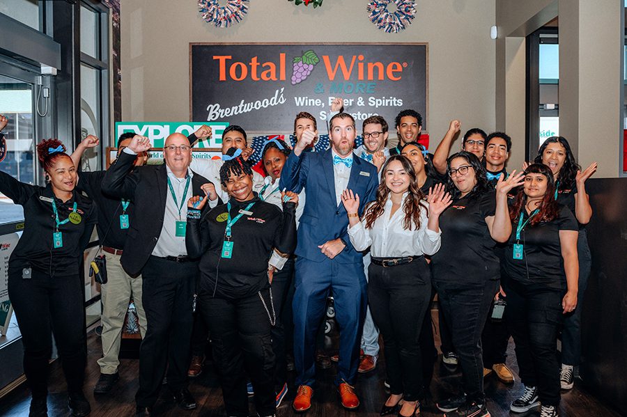 Group of celebrating Total Wine employees